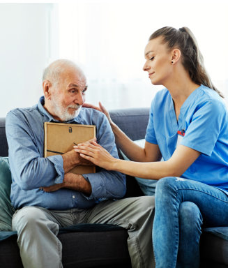an elderly man with his caregiver