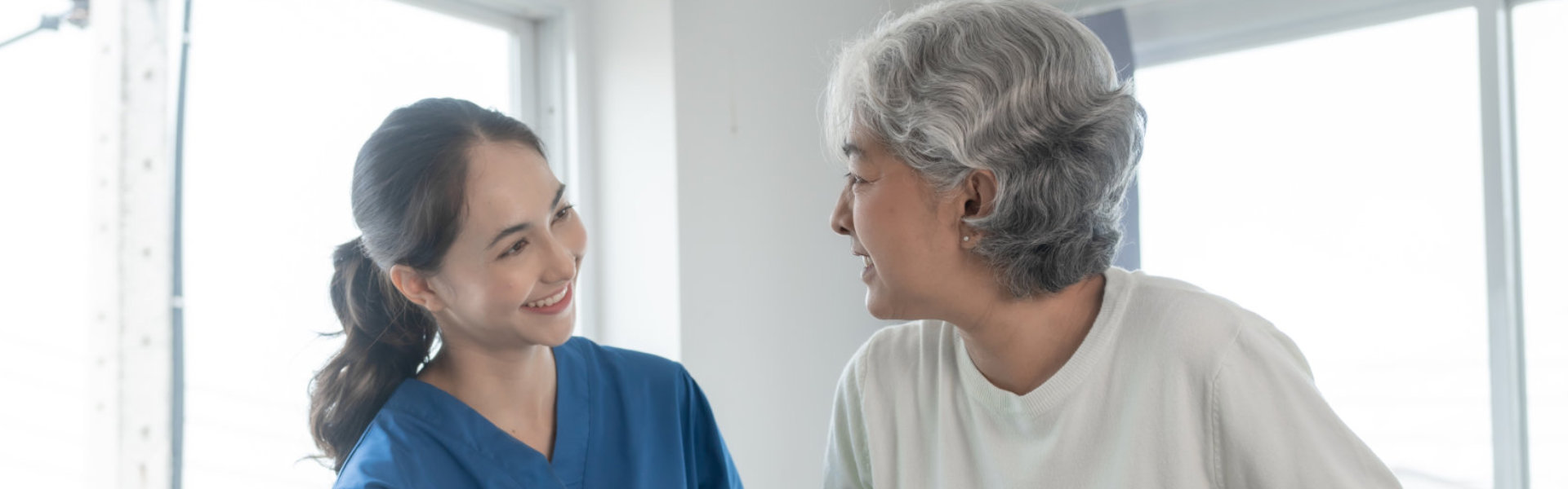 woman and senior smiling