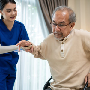woman helping senior