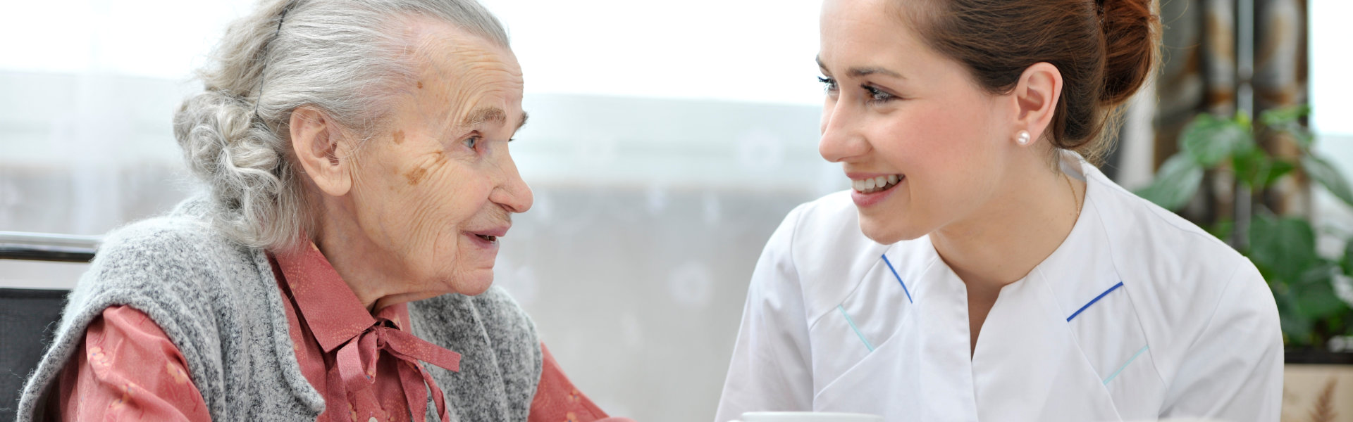 woman and senior smiling